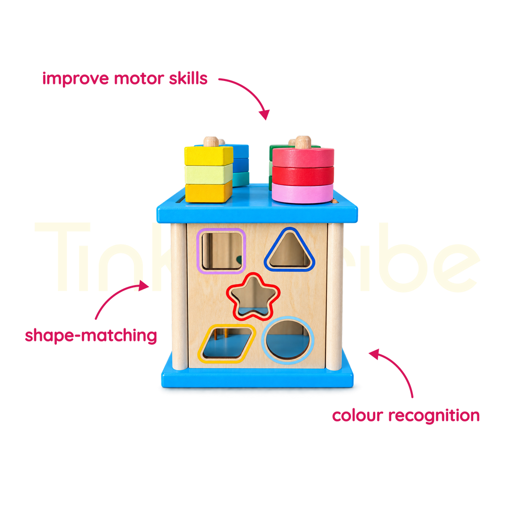 Colourful shapes stacked on the wooden activity cube pegs