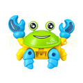 Colourful green crawling crab toy with raised blue claws