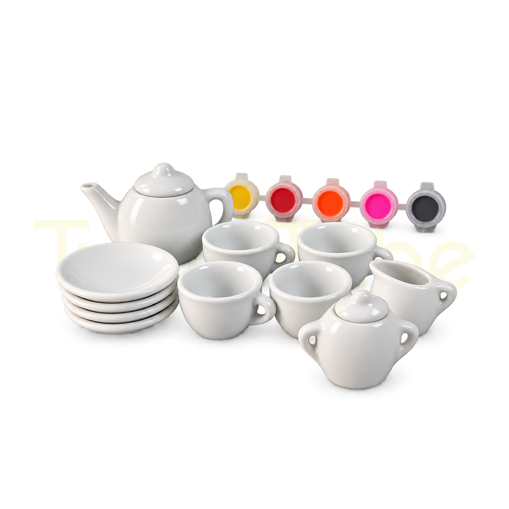 White ceramic tea set with cups, saucers, teapot and colourful paints