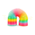 Rainbow Magic Spring flexible coil toy stretched into an arch